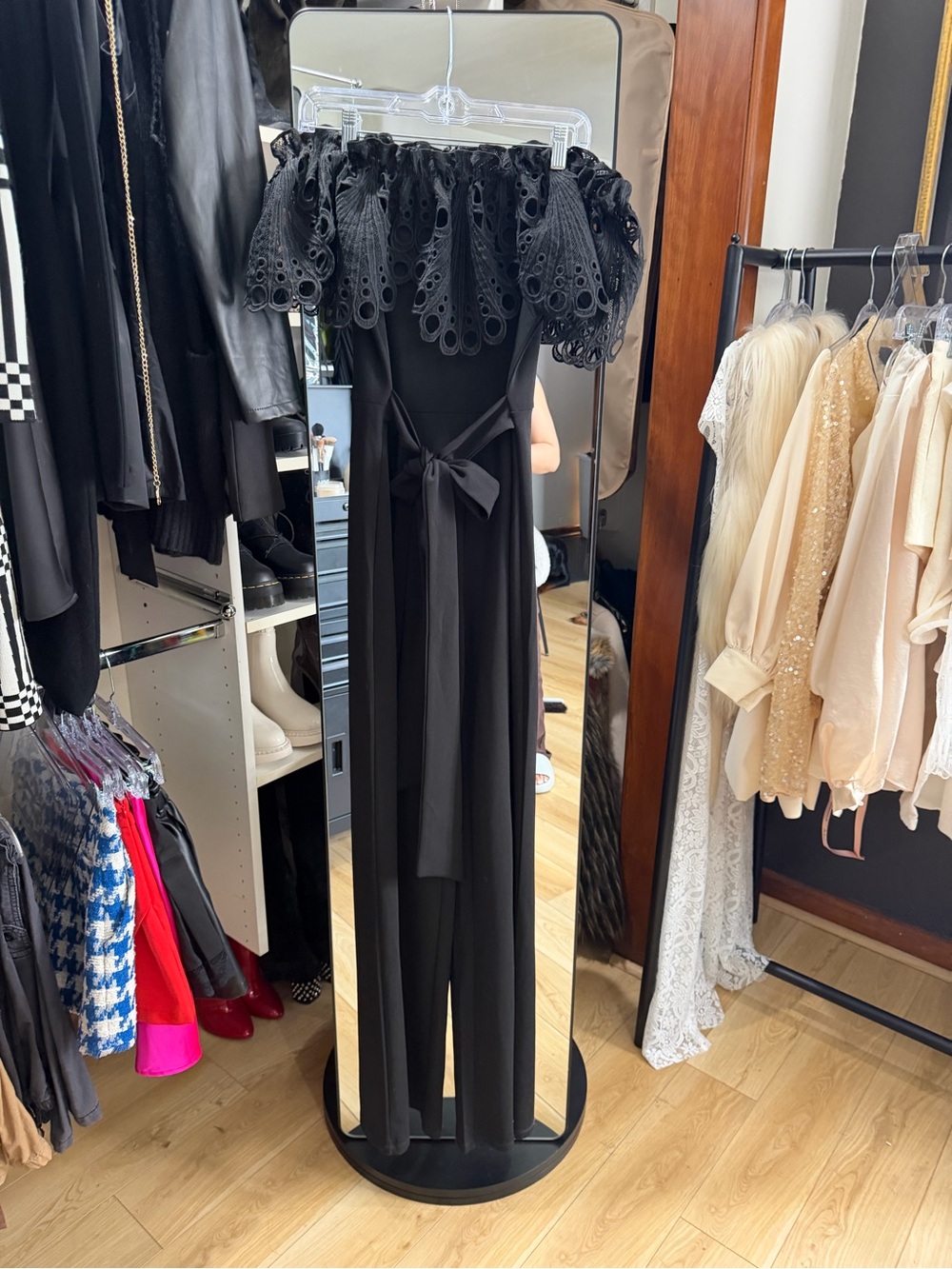 Black Off-Shoulder Eyelet Ruffle Jumpsuit with Waist Tie